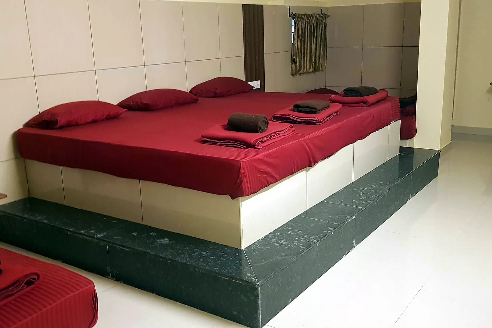 Nisarga Inn Grand — Multi-bed room