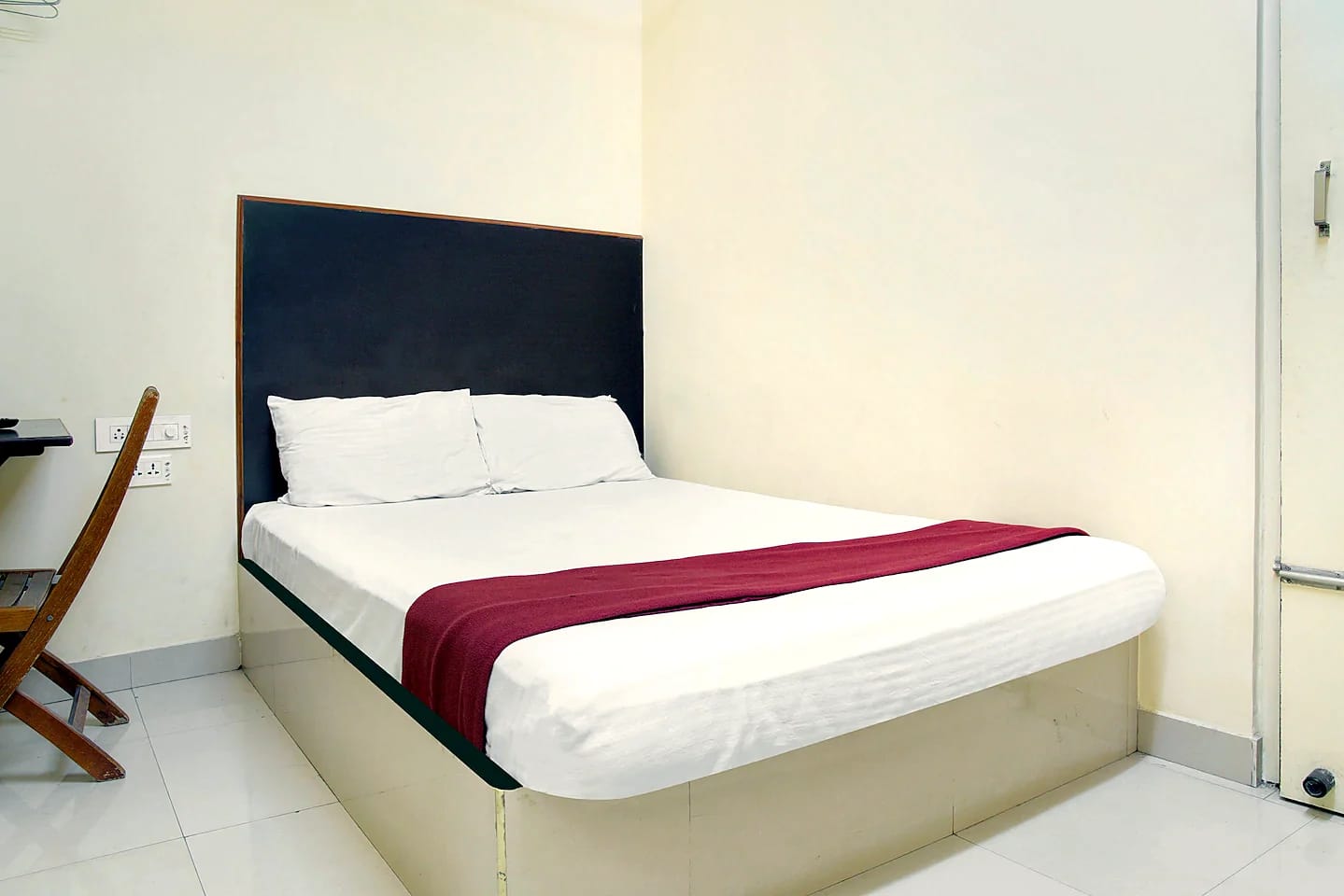 Nisarga Lodge — Deluxe room, double bed (representative photo)