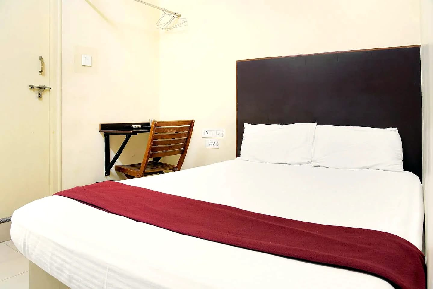Nisarga Lodge — Deluxe room (representative photo)