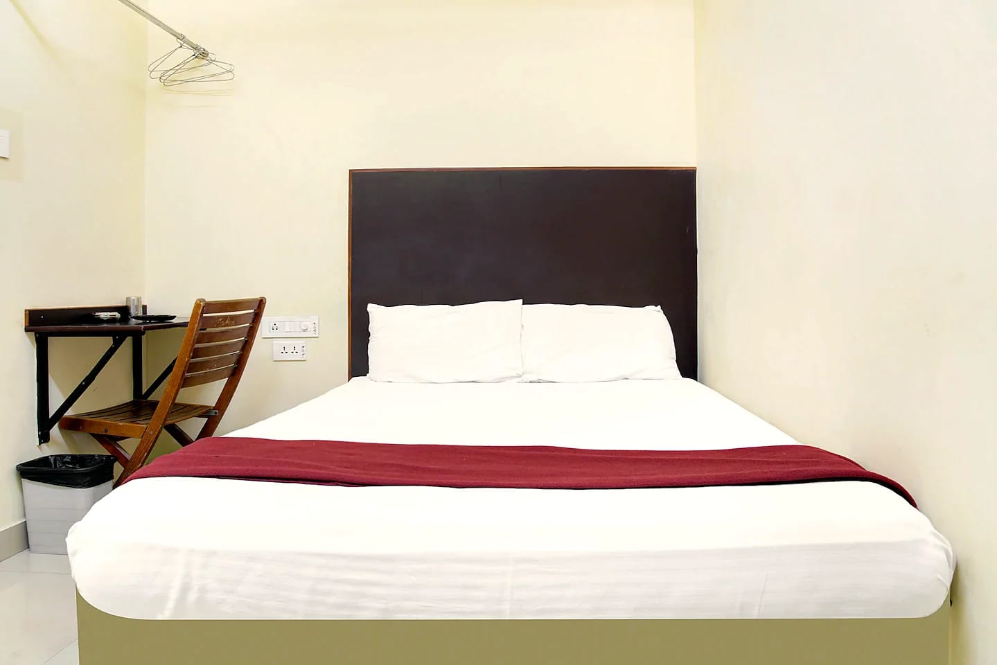 Nisarga Lodge — Deluxe room with desk (representative photo)