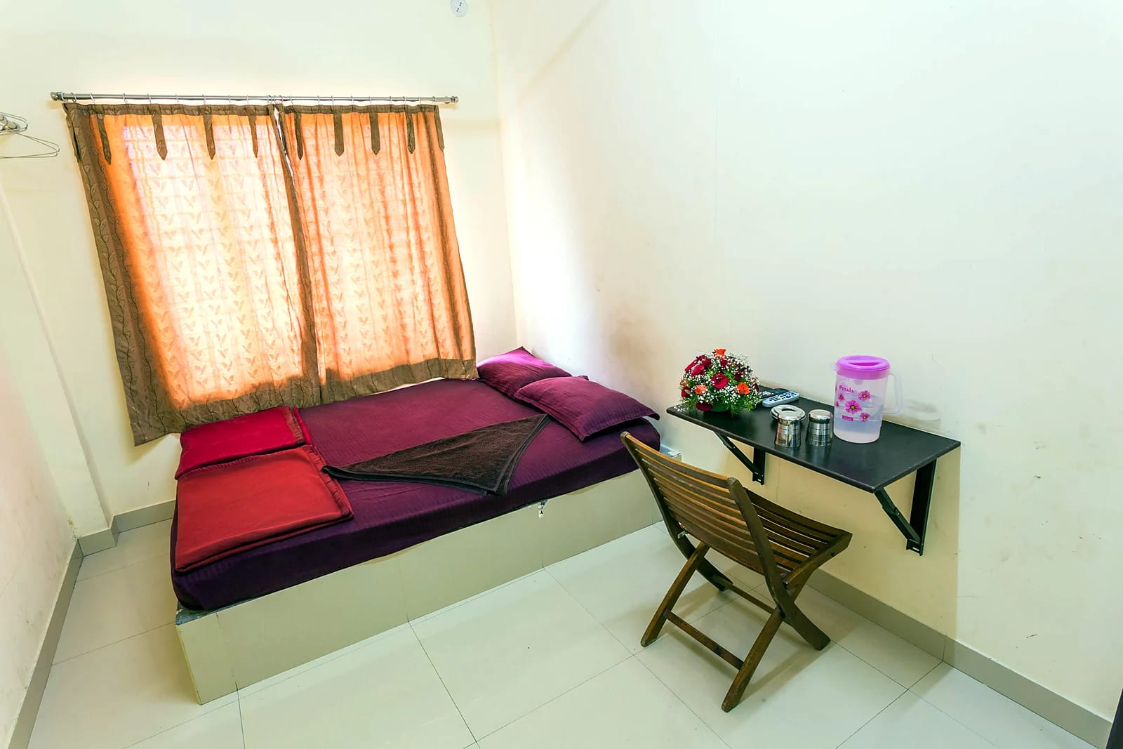 Nisarga Lodge — Room with floor mattress (representative photo)