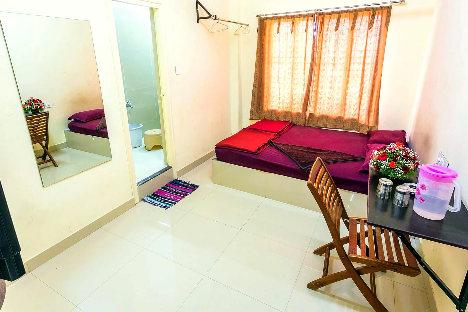 Nisarga Lodge — Room (representative photo)